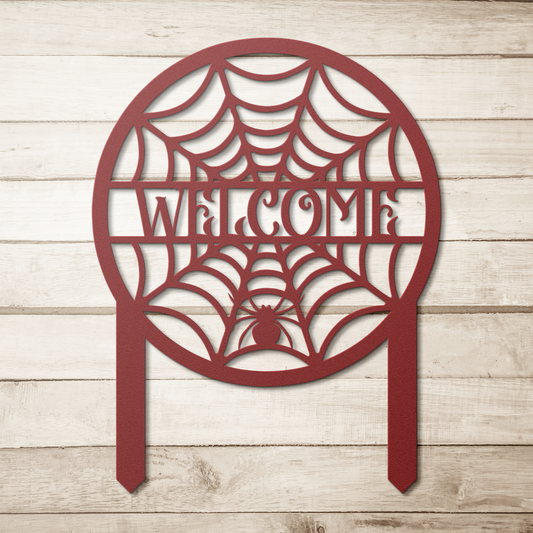Spider_Web_Garden_Stake_Metal_Sign_Red_Simple_Wood_BKGD_Mockup.png