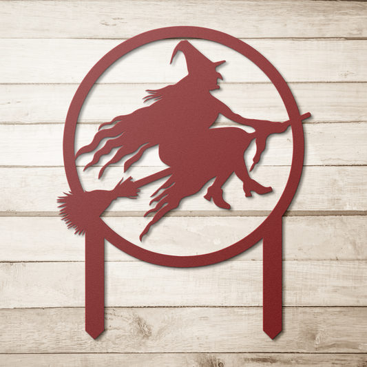 Witch_With_Broomstick_Garden_Stake_Metal_Red_Simple_Wood_BKGD_Mockup.png